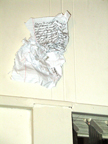 Destroyed Notebook Pages on wall